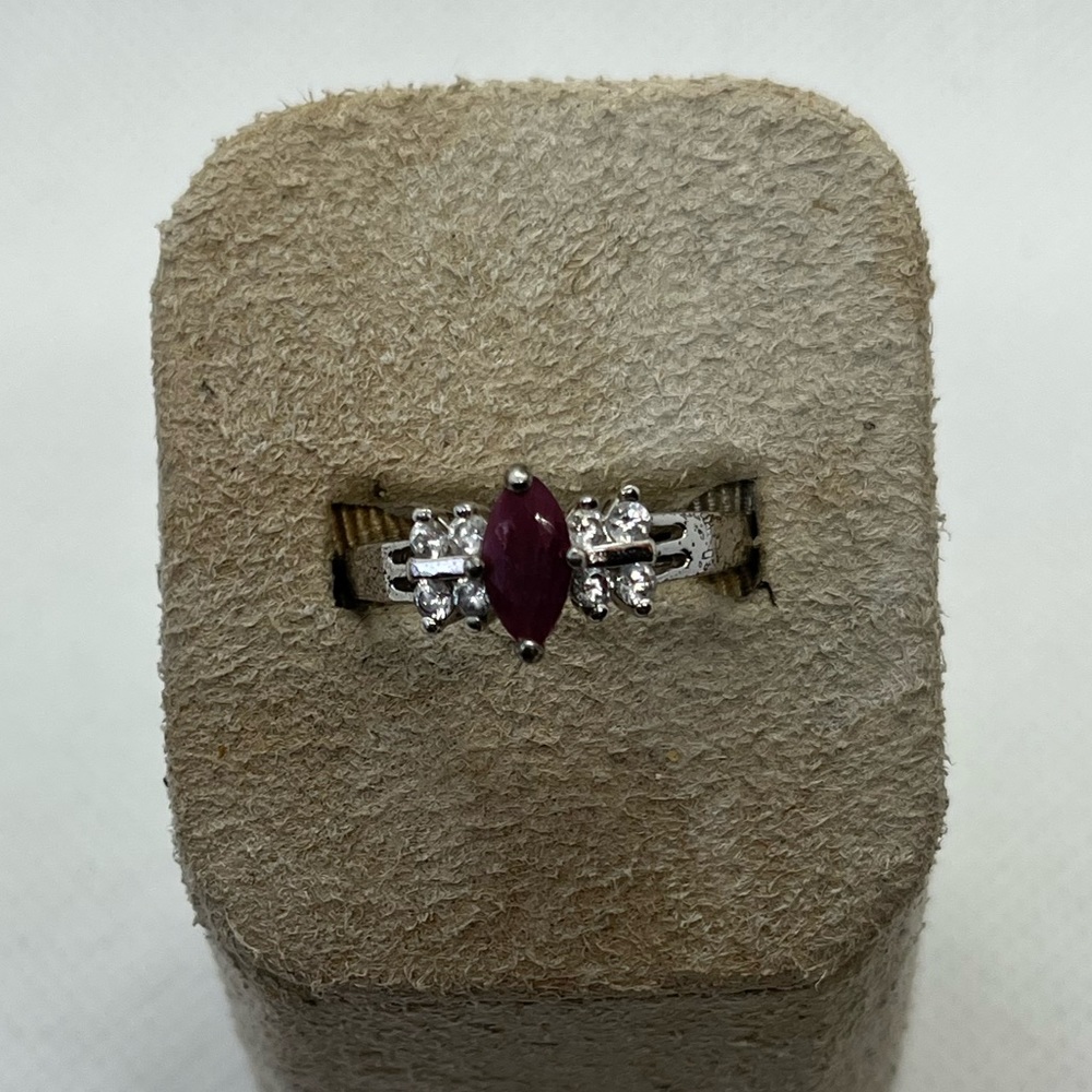 Ladies genuine marquise ruby and CZ sterling silver ring size 8.